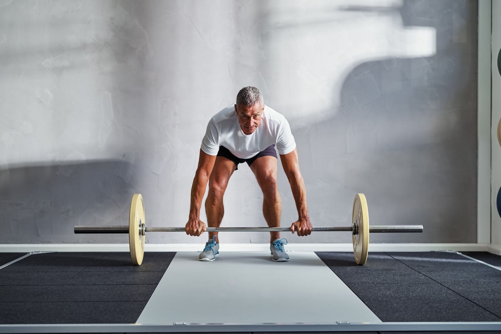 Older man deadlift