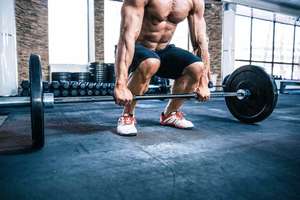 Man performing deadlifts.