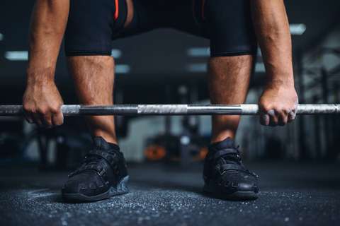 Man performing deadlift exercise