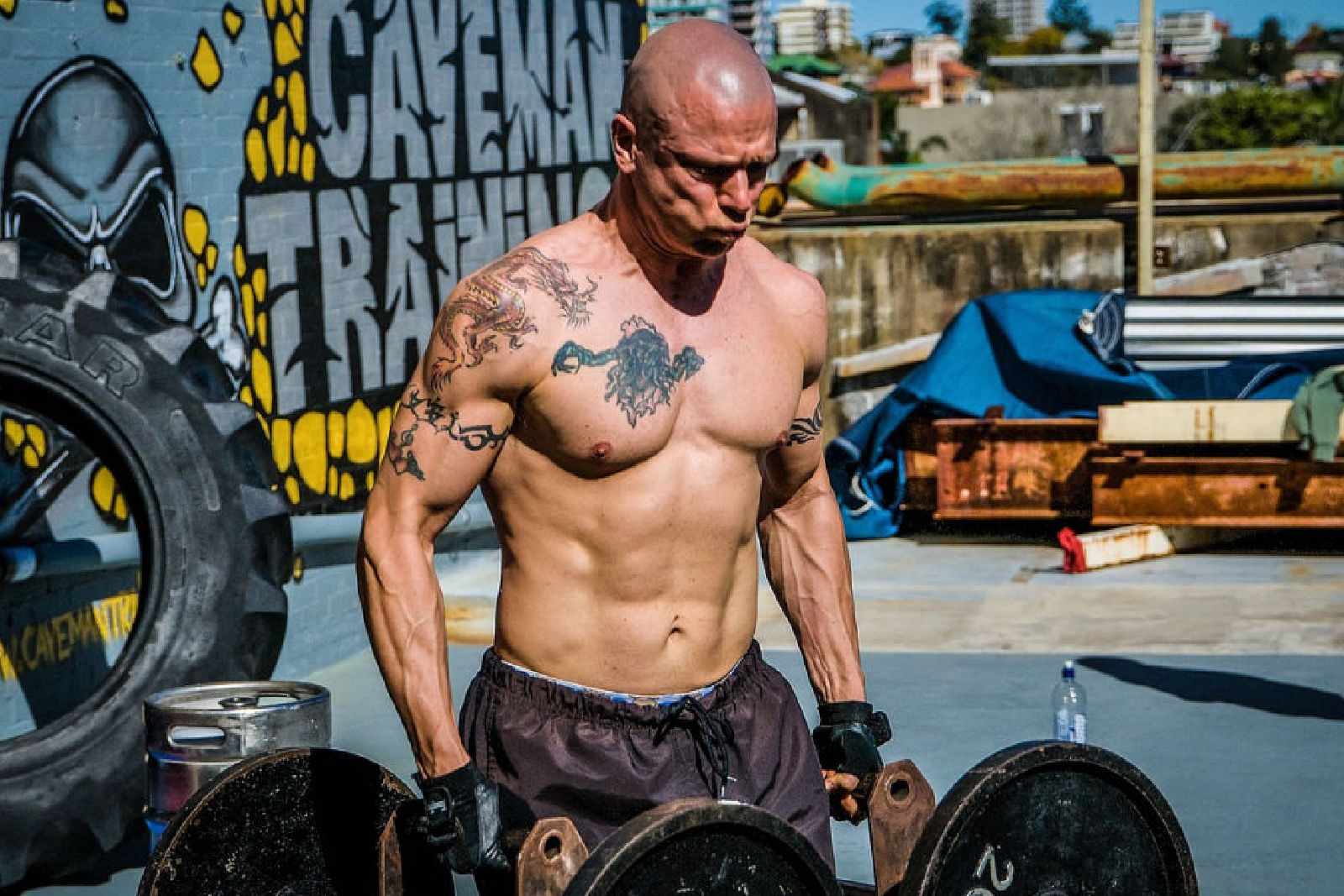 Man doing loaded carries